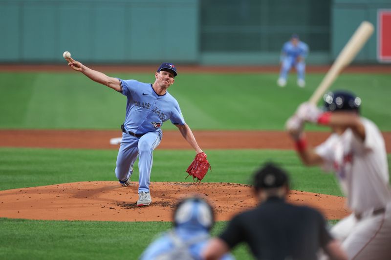 Aug 28, 2024; Boston, Massachusetts, USA; Toronto Blue Jays starting pitcher Chris Bassitt (40) throws a pitch during the first inning against the Boston Red Sox at Fenway Park. Mandatory Credit: Paul Rutherford-USA TODAY Sports