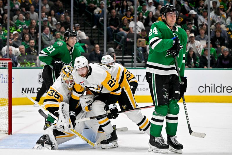 Mar 22, 2024; Dallas, Texas, USA; Pittsburgh Penguins defenseman Marcus Pettersson (28) collides with goaltender Tristan Jarry (35) as Dallas Stars left wing Jamie Benn (not pictured) scores a goal past center Roope Hintz (24) and left wing Jason Robertson (21) during the second period at the American Airlines Center. Mandatory Credit: Jerome Miron-USA TODAY Sports