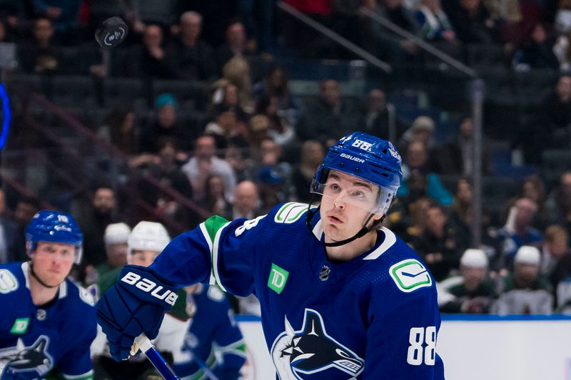 Jan 18, 2024; Vancouver, British Columbia, CAN; Vancouver Canucks forward Nils Aman (88) watches teh flying puck against the Arizona Coyotes in the second period at Rogers Arena. Mandatory Credit: Bob Frid-USA TODAY Sports