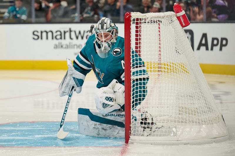 Oct 20, 2024; San Jose, California, USA; San Jose Sharks goaltender Vitek Vanecek (41) warms up on the ice before the start of the first period against the Colorado Avalanche at SAP Center at San Jose. Mandatory Credit: Robert Edwards-Imagn Images