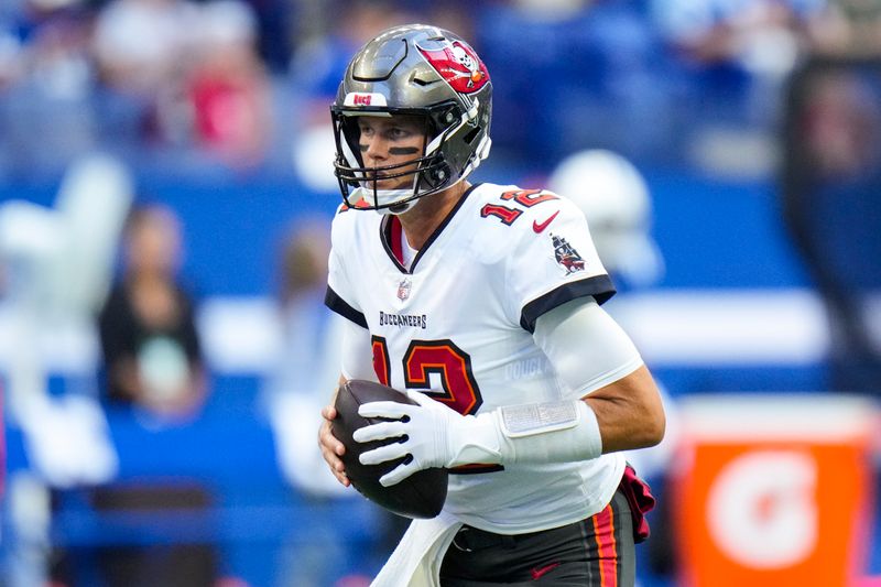 Tampa Bay Buccaneers quarterback Tom Brady (12) warms up before an NFL preseason preseason football game against the Indianapolis Colts in Indianapolis, Saturday, Aug. 27, 2022. (AP Photo/AJ Mast)