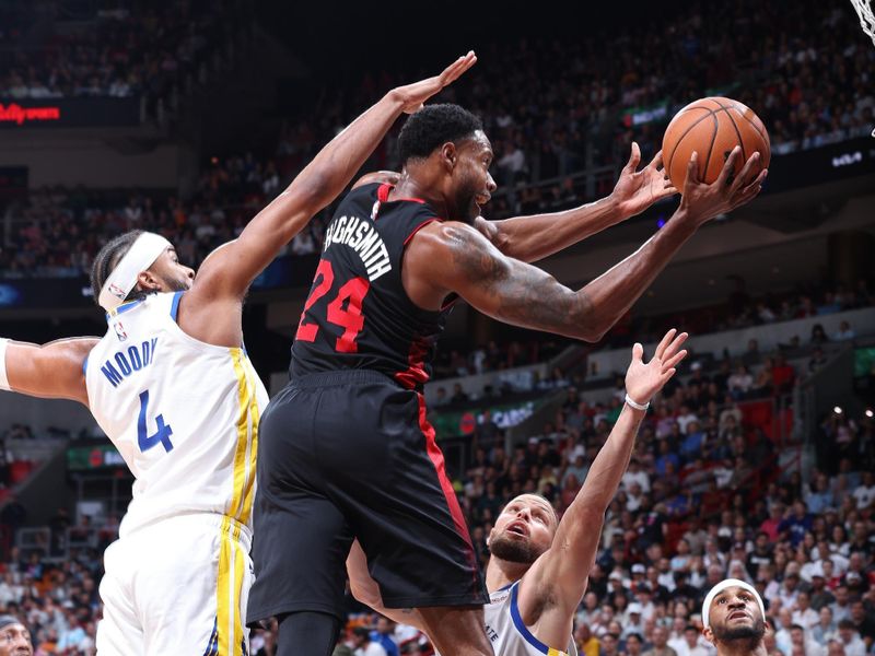 MIAMI, FL - MARCH 26:  Haywood Highsmith #24 of the Miami Heat shoots the ball during the game against the Golden State Warriors on March 26, 2024 at Kaseya Center in Miami, Florida. NOTE TO USER: User expressly acknowledges and agrees that, by downloading and or using this Photograph, user is consenting to the terms and conditions of the Getty Images License Agreement. Mandatory Copyright Notice: Copyright 2024 NBAE (Photo by Jeff Haynes/NBAE via Getty Images)