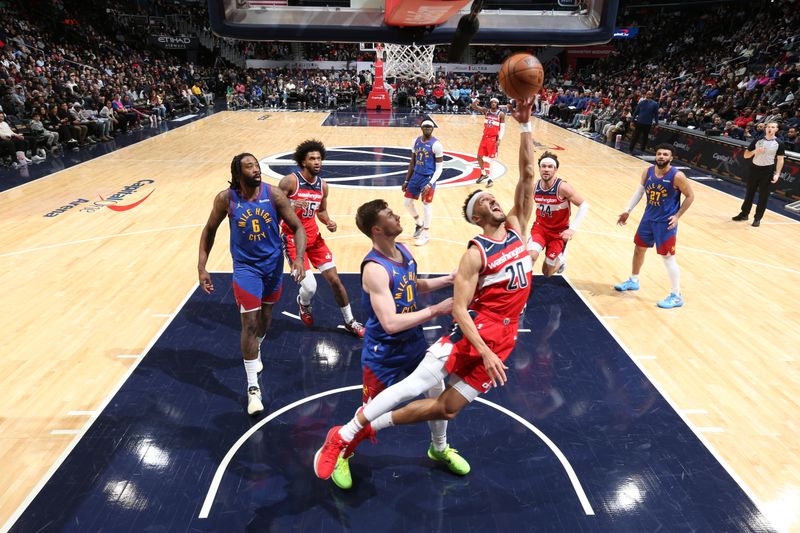 WASHINGTON, DC -? JANUARY 21:  Landry Shamet #20 of the Washington Wizards goes to the basket during the game on January 21, 2024 at Capital One Arena in Washington, DC. NOTE TO USER: User expressly acknowledges and agrees that, by downloading and or using this Photograph, user is consenting to the terms and conditions of the Getty Images License Agreement. Mandatory Copyright Notice: Copyright 2024 NBAE (Photo by Stephen Gosling/NBAE via Getty Images)