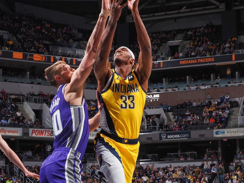 INDIANAPOLIS, IN - FEBUARY 3:  Myles Turner #33 of the Indiana Pacers drives to the basket during the game on Febuary 3, 2023 at Gainbridge Fieldhouse in Indianapolis, Indiana. NOTE TO USER: User expressly acknowledges and agrees that, by downloading and or using this Photograph, user is consenting to the terms and conditions of the Getty Images License Agreement. Mandatory Copyright Notice: Copyright 2023 NBAE (Photo by Ron Hoskins/NBAE via Getty Images)