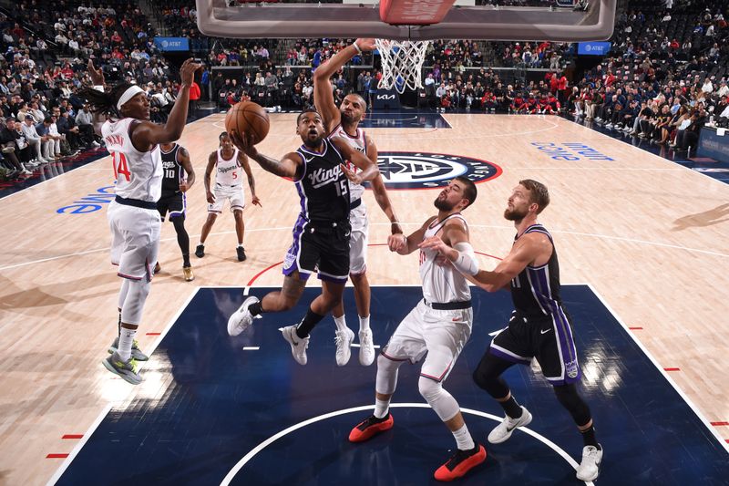 INGLEWOOD, CA - OCTOBER 17: Mason Jones #15 of the Sacramento Kings drives to the basket during the game against the LA Clippers on October 17, 2024 at Intuit Dome in Los Angeles, California. NOTE TO USER: User expressly acknowledges and agrees that, by downloading and/or using this Photograph, user is consenting to the terms and conditions of the Getty Images License Agreement. Mandatory Copyright Notice: Copyright 2024 NBAE (Photo by Juan Ocampo/NBAE via Getty Images)