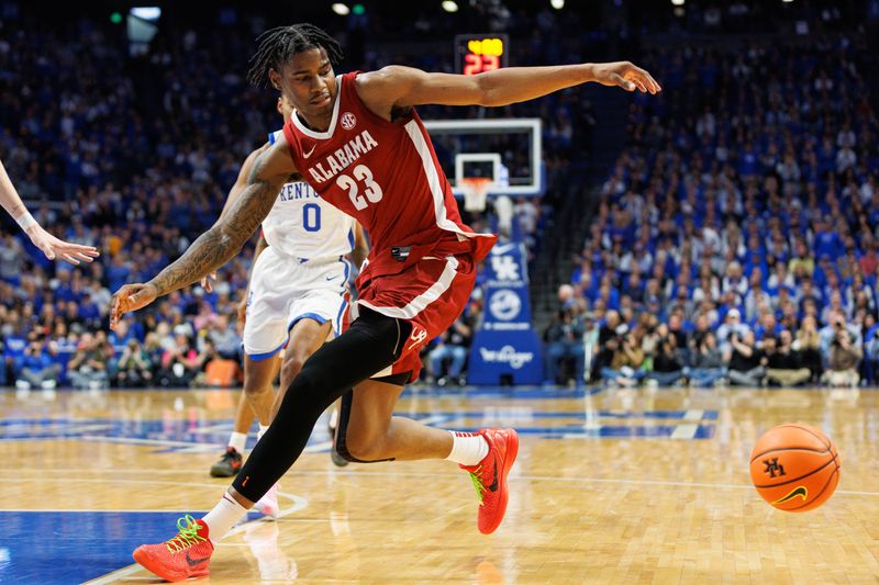 Feb 24, 2024; Lexington, Kentucky, USA; Alabama Crimson Tide forward Nick Pringle (23) looses control of the ball during the first half against the Kentucky Wildcats at Rupp Arena at Central Bank Center. Mandatory Credit: Jordan Prather-USA TODAY Sports