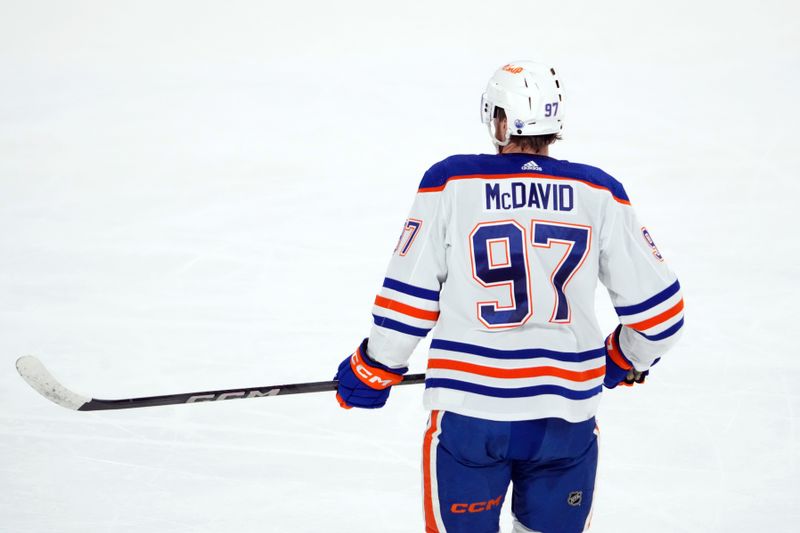 Feb 19, 2024; Tempe, Arizona, USA; Edmonton Oilers center Connor McDavid (97) skates against the Arizona Coyotes during the first period at Mullett Arena. Mandatory Credit: Joe Camporeale-USA TODAY Sports