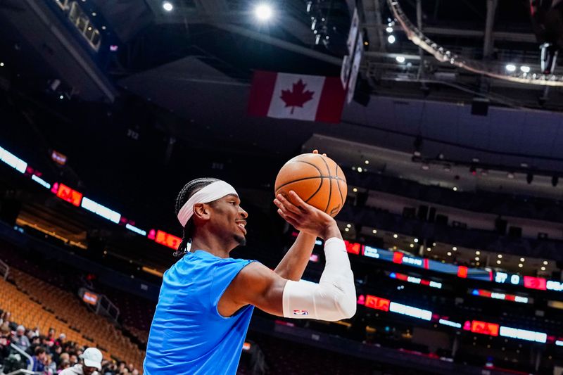 TORONTO, CANADA - MARCH 22:  Shai Gilgeous-Alexander #2 of the Oklahoma City Thunder warms up before the game against the Toronto Raptors on March 22, 2024 at the Scotiabank Arena in Toronto, Ontario, Canada.  NOTE TO USER: User expressly acknowledges and agrees that, by downloading and or using this Photograph, user is consenting to the terms and conditions of the Getty Images License Agreement.  Mandatory Copyright Notice: Copyright 2024 NBAE (Photo by Mark Blinch/NBAE via Getty Images)