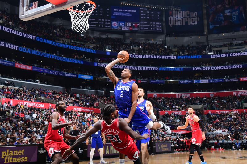 LOS ANGELES, CA - MARCH 27: Kawhi Leonard #2 of the LA Clippers drives to the basket during the game against the Chicago Bulls on March 27, 2023 at Crypto.Com Arena in Los Angeles, California. NOTE TO USER: User expressly acknowledges and agrees that, by downloading and/or using this Photograph, user is consenting to the terms and conditions of the Getty Images License Agreement. Mandatory Copyright Notice: Copyright 2023 NBAE (Photo by Adam Pantozzi/NBAE via Getty Images)