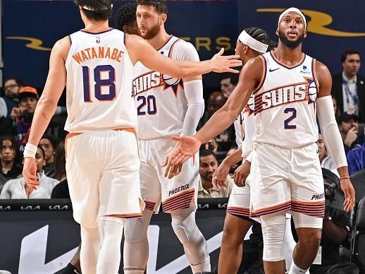 DETROIT, MI - NOVEMBER 5: Yuta Watanabe #18 and Josh Okogie #2 of the Phoenix Suns high five during the game against the Detroit Pistons on November 5, 2023 at Little Caesars Arena in Detroit, Michigan. NOTE TO USER: User expressly acknowledges and agrees that, by downloading and/or using this photograph, User is consenting to the terms and conditions of the Getty Images License Agreement. Mandatory Copyright Notice: Copyright 2023 NBAE (Photo by Chris Schwegler/NBAE via Getty Images)