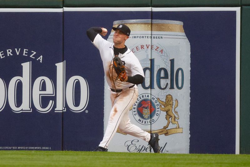 Sep 28, 2024; Detroit, Michigan, USA; Detroit Tigers outfielder Kerry Carpenter (30) returns the ball to the infield against the Chicago White Sox during the fifth inning at Comerica Park. Mandatory Credit: Brian Bradshaw Sevald-Imagn Images