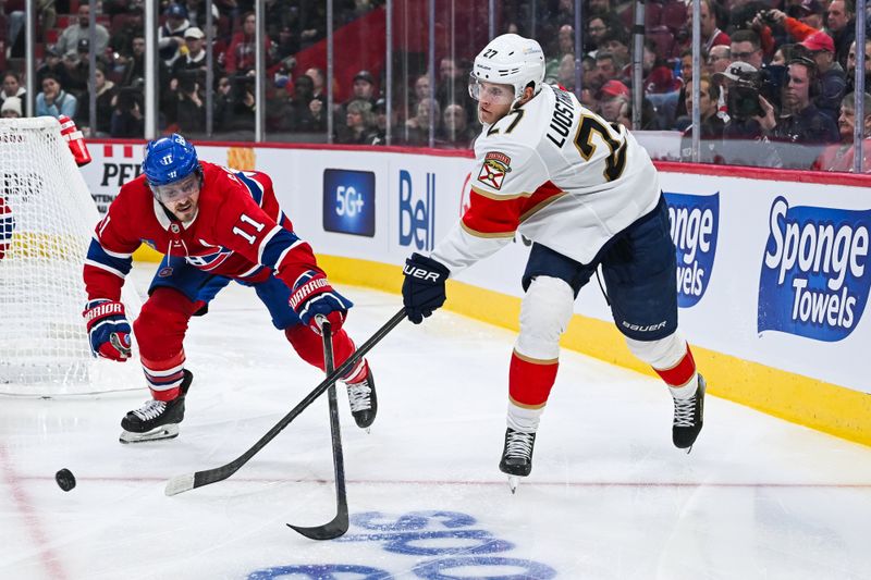 Mar 15, 2025; Montreal, Quebec, CAN; Montreal Canadiens right wing Brendan Gallagher (11) defends against Florida Panthers center Eetu Luostarinen (27) in the second period at Bell Centre. Mandatory Credit: David Kirouac-Imagn Images