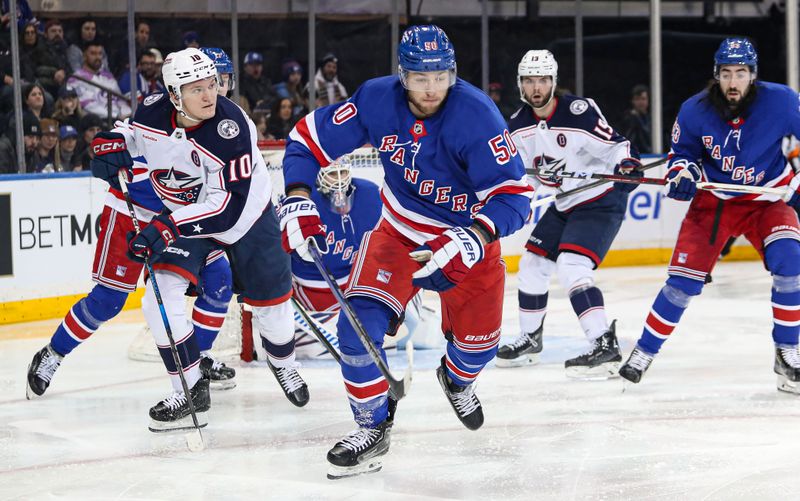 Jan 18, 2025; New York, New York, USA; New York Rangers left wing Will Cuylle (50) chases after the puck against the Columbus Blue Jackets during the second period at Madison Square Garden. Mandatory Credit: Danny Wild-Imagn Images