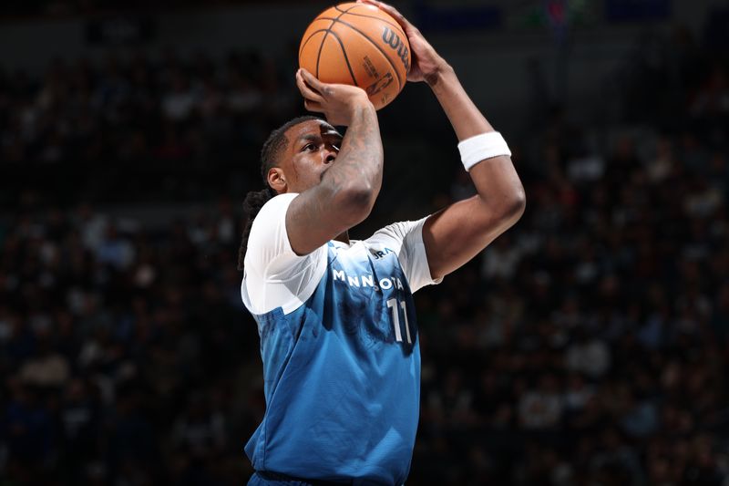 MINNEAPOLIS, MN -  APRIL 12: Naz Reid #11 of the Minnesota Timberwolves shoots a free throw during the game against the Atlanta Hawks on April 12, 2024 at Target Center in Minneapolis, Minnesota. NOTE TO USER: User expressly acknowledges and agrees that, by downloading and or using this Photograph, user is consenting to the terms and conditions of the Getty Images License Agreement. Mandatory Copyright Notice: Copyright 2024 NBAE (Photo by David Sherman/NBAE via Getty Images)