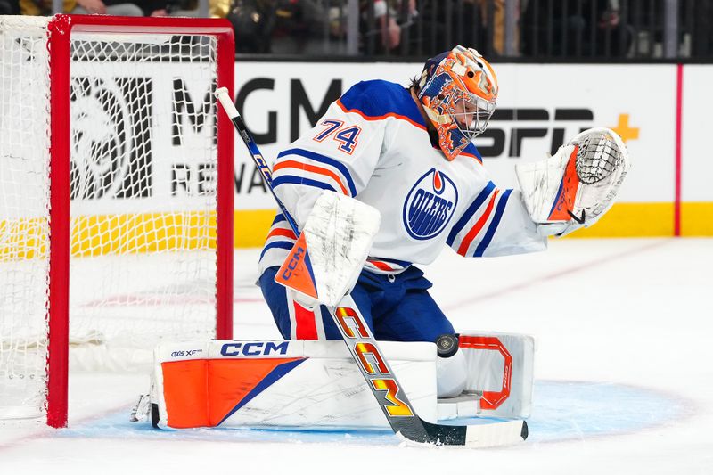 Feb 6, 2024; Las Vegas, Nevada, USAEdmonton Oilers goaltender Stuart Skinner (74) makes a save against the Vegas Golden Knights during the first period at T-Mobile Arena. Mandatory Credit: Stephen R. Sylvanie-USA TODAY Sports