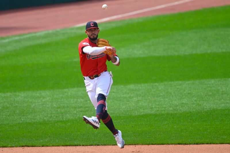 May 5, 2024; Cleveland, Ohio, USA; Cleveland Guardians shortstop Gabriel Arias (13) throws to first base in the eighth inning against the Los Angeles Angels at Progressive Field. Mandatory Credit: David Richard-USA TODAY Sports