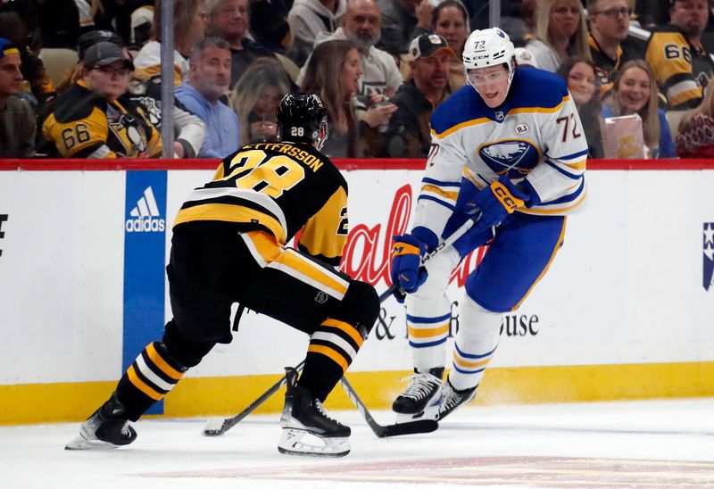 Jan 6, 2024; Pittsburgh, Pennsylvania, USA;  Buffalo Sabres right wing Tage Thompson (72) skates up ice with the puck against Pittsburgh Penguins defenseman Marcus Pettersson (28) during the second period  at PPG Paints Arena. Mandatory Credit: Charles LeClaire-USA TODAY Sports