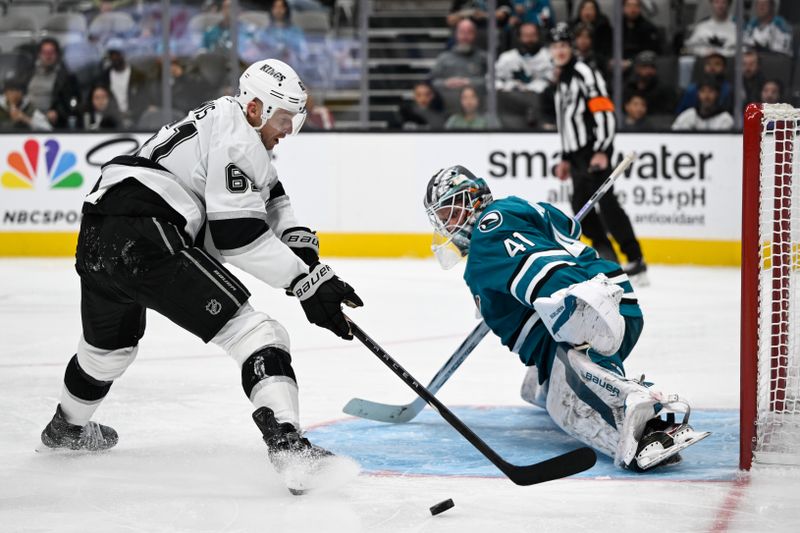 Oct 29, 2024; San Jose, California, USA; San Jose Sharks goaltender Vitek Vanecek (41) blocks a shot by Los Angeles Kings center Trevor Lewis (61) in the third period at SAP Center at San Jose. Mandatory Credit: Eakin Howard-Imagn Images