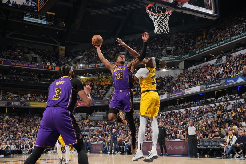 INDIANAPOLIS, IN - MARCH 29: Rui Hachimura #28 of the Los Angeles Lakers dunks the ball during the game against the Indiana Pacers on March 24, 2024 at Gainbridge Fieldhouse in Indianapolis, Indiana. NOTE TO USER: User expressly acknowledges and agrees that, by downloading and or using this Photograph, user is consenting to the terms and conditions of the Getty Images License Agreement. Mandatory Copyright Notice: Copyright 2024 NBAE (Photo by Jesse D. Garrabrant /NBAE via Getty Images)