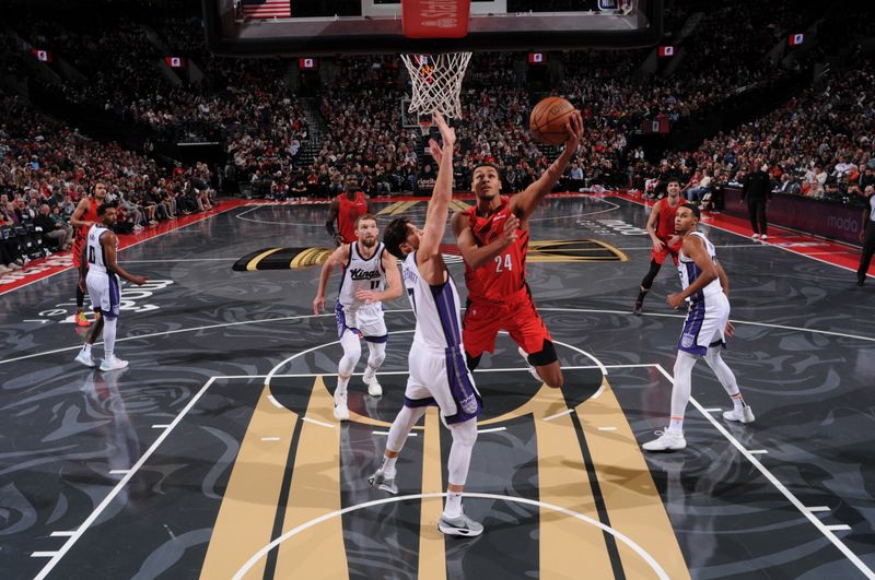 PORTLAND, OR - NOVEMBER 29: Kris Murray #24 of the Portland Trail Blazers drives to the basket during the game against the Sacramento Kings during the Emirates NBA Cup on November 29, 2024 at the Moda Center Arena in Portland, Oregon. NOTE TO USER: User expressly acknowledges and agrees that, by downloading and or using this photograph, user is consenting to the terms and conditions of the Getty Images License Agreement. Mandatory Copyright Notice: Copyright 2024 NBAE (Photo by Cameron Browne/NBAE via Getty Images)