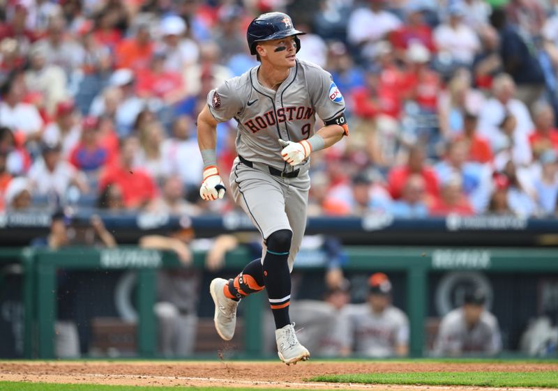 Aug 28, 2024; Philadelphia, Pennsylvania, USA; Houston Astros first baseman Zach Dezenzo (9) runs to first after hitting a single against the Philadelphia Phillies in the sixth inning at Citizens Bank Park. Mandatory Credit: Kyle Ross-USA TODAY Sports