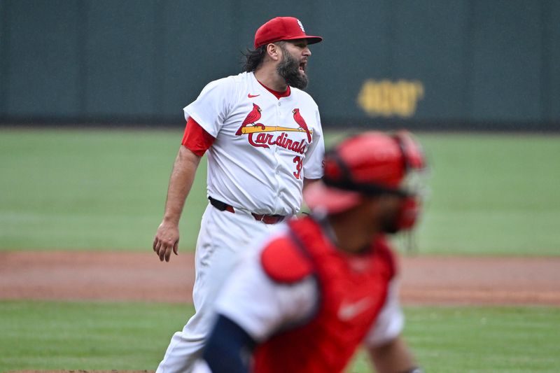 Apr 10, 2024; St. Louis, Missouri, USA;  St. Louis Cardinals starting pitcher Lance Lynn (31) reacts after striking out Philadelphia Phillies third baseman Alec Bohm (not pictured) to end the top half of the third inning at Busch Stadium. Mandatory Credit: Jeff Curry-USA TODAY Sports