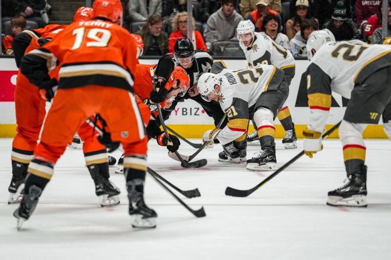 Nov 22, 2025; Anaheim, California, USA;  Face off between the Anaheim Ducks and the Vegas Golden Knights during the first period at Honda Center. Mandatory Credit: Corinne Votaw-Imagn Images