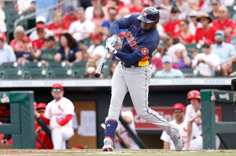 Mar 7, 2024; Jupiter, Florida, USA; Houston Astros designated hitter Yordan Alvarez (44) singles against the St. Louis Cardinals in the first inning at Roger Dean Chevrolet Stadium. Mandatory Credit: Rhona Wise-USA TODAY Sports