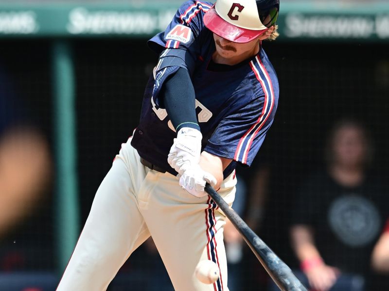 May 22, 2024; Cleveland, Ohio, USA; Cleveland Guardians first baseman Kyle Manzardo (9) hits an RBI double during the eighth inning against the New York Mets at Progressive Field. Mandatory Credit: Ken Blaze-USA TODAY Sports
