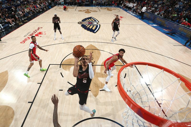 NEW ORLEANS, LA - MARCH 16: Dalano Banton #5 of the Portland Trail Blazers drives to the basket during the game against the New Orleans Pelicans on March 16, 2024 at the Smoothie King Center in New Orleans, Louisiana. NOTE TO USER: User expressly acknowledges and agrees that, by downloading and or using this Photograph, user is consenting to the terms and conditions of the Getty Images License Agreement. Mandatory Copyright Notice: Copyright 2024 NBAE (Photo by Layne Murdoch Jr./NBAE via Getty Images)