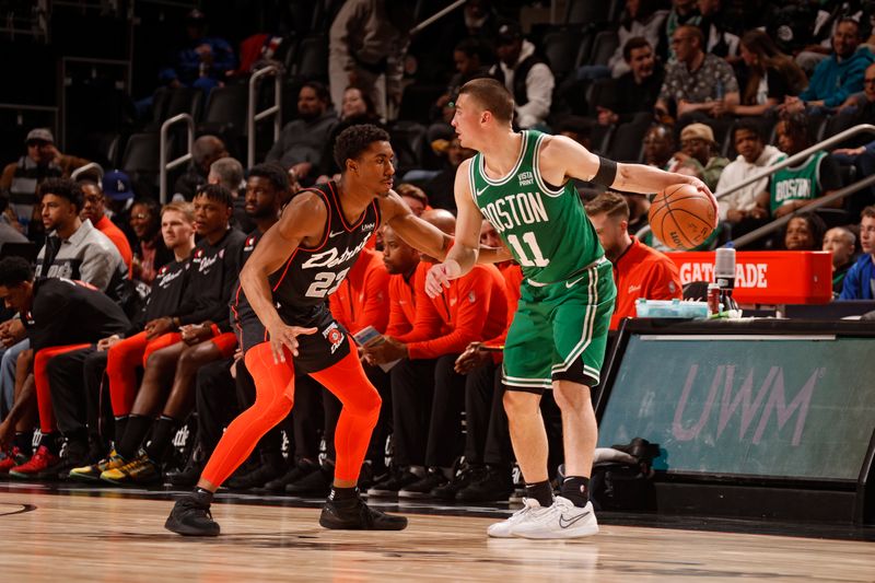 DETROIT, MI - MARCH 22:Jaden Ivey #23 of the Detroit Pistons plays defense against Payton Pritchard #11 of the Boston Celtics  on March 22, 2024 at Little Caesars Arena in Detroit, Michigan. NOTE TO USER: User expressly acknowledges and agrees that, by downloading and/or using this photograph, User is consenting to the terms and conditions of the Getty Images License Agreement. Mandatory Copyright Notice: Copyright 2024 NBAE (Photo by Brian Sevald/NBAE via Getty Images)