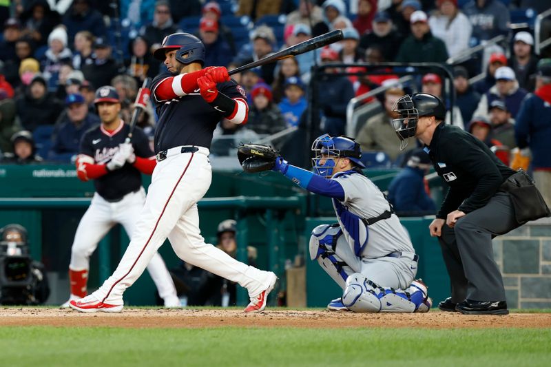 Apr 8, 2025; Washington, District of Columbia, USA; Washington Nationals catcher Keibert Ruiz (20) hits a two run single against the Los Angeles Dodgers during the second inning at Nationals Park. Mandatory Credit: Geoff Burke-Imagn Images