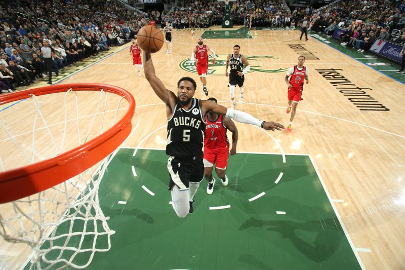 MILWAUKEE, WI - JANUARY 27:  Malik Beasley #5 of the Milwaukee Bucks goes to the basket during the game on January 27, 2024 at the Fiserv Forum Center in Milwaukee, Wisconsin. NOTE TO USER: User expressly acknowledges and agrees that, by downloading and or using this Photograph, user is consenting to the terms and conditions of the Getty Images License Agreement. Mandatory Copyright Notice: Copyright 2024 NBAE (Photo by Gary Dineen/NBAE via Getty Images).