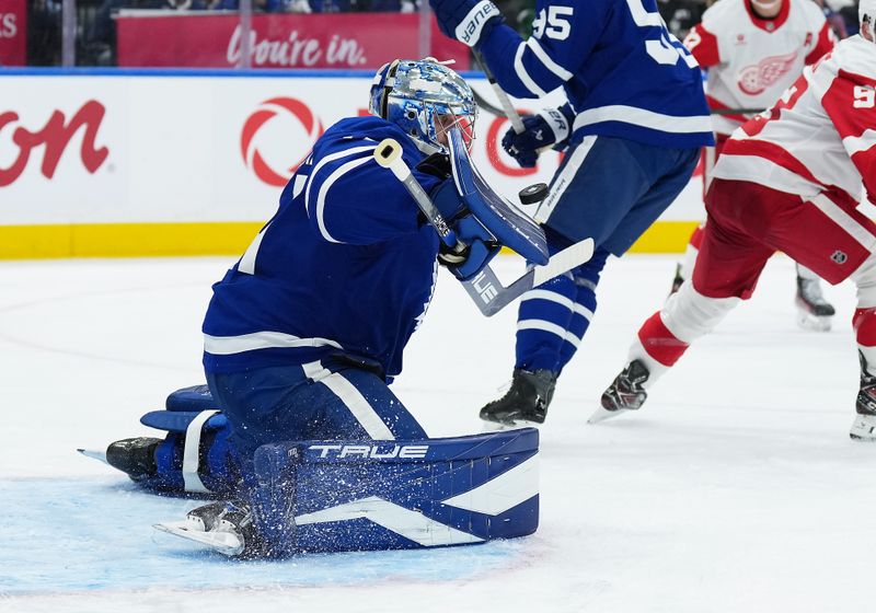 Oct 2, 2025; Toronto, Ontario, CAN; Toronto Maple Leafs goaltender Anthony Stolarz (41) stops a puck against the Detroit Red Wings during the second period at Scotiabank Arena. Mandatory Credit: Nick Turchiaro-Imagn Images
