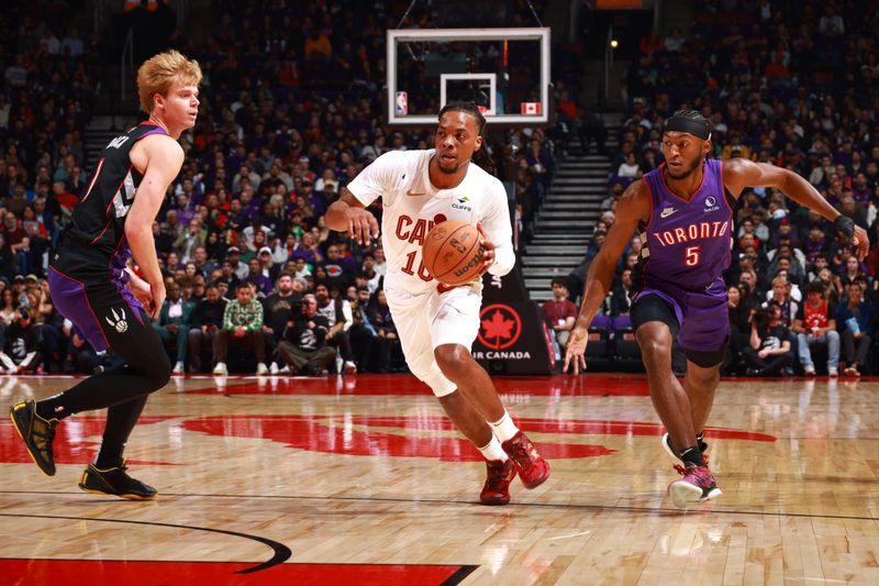 TORONTO, CANADA - OCTOBER 23: Darius Garland #10 of the Cleveland Cavaliers drives to the basket during the game against the Toronto Raptors on October 23, 2024 at the Scotiabank Arena in Toronto, Ontario, Canada.  NOTE TO USER: User expressly acknowledges and agrees that, by downloading and or using this Photograph, user is consenting to the terms and conditions of the Getty Images License Agreement.  Mandatory Copyright Notice: Copyright 2024 NBAE (Photo by Vaughn Ridley/NBAE via Getty Images)