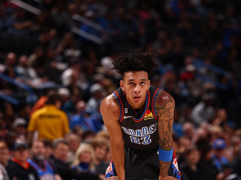 OKLAHOMA CITY, OK - JANUARY 6:  Tre Mann #23 of the Oklahoma City Thunder looks on during the game against the Washington Wizards on January 6, 2023 at Paycom Arena in Oklahoma City, Oklahoma. NOTE TO USER: User expressly acknowledges and agrees that, by downloading and or using this photograph, User is consenting to the terms and conditions of the Getty Images License Agreement. Mandatory Copyright Notice: Copyright 2023 NBAE (Photo by Zach Beeker/NBAE via Getty Images)