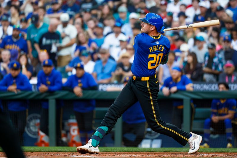 Aug 2, 2024; Seattle, Washington, USA; Seattle Mariners first baseman Luke Raley (20) hits a three-run home run against the Philadelphia Phillies during the second inning at T-Mobile Park. Mandatory Credit: Joe Nicholson-USA TODAY Sports