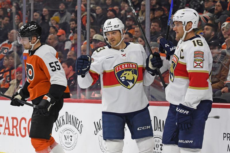 Dec 5, 2024; Philadelphia, Pennsylvania, USA; Florida Panthers center Aleksander Barkov (16) celebrates his goal with center Sam Reinhart (13) against the Philadelphia Flyers eduring the second period at Wells Fargo Center. Mandatory Credit: Eric Hartline-Imagn Images