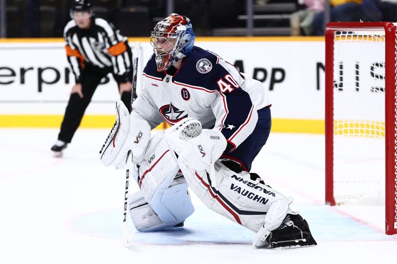 Oct 26, 2024; Nashville, Tennessee, USA; Columbus Blue Jackets goaltender Daniil Tarasov (40) sets up for a face-off late against the Nashville Predators in the first period at Bridgestone Arena. Mandatory Credit: Casey Gower-Imagn Images