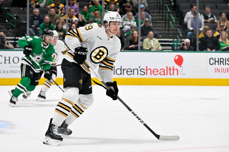 Nov 6, 2023; Dallas, Texas, USA; Boston Bruins center Johnny Beecher (19) skates against the Dallas Stars during the first period at the American Airlines Center. Mandatory Credit: Jerome Miron-USA TODAY Sports