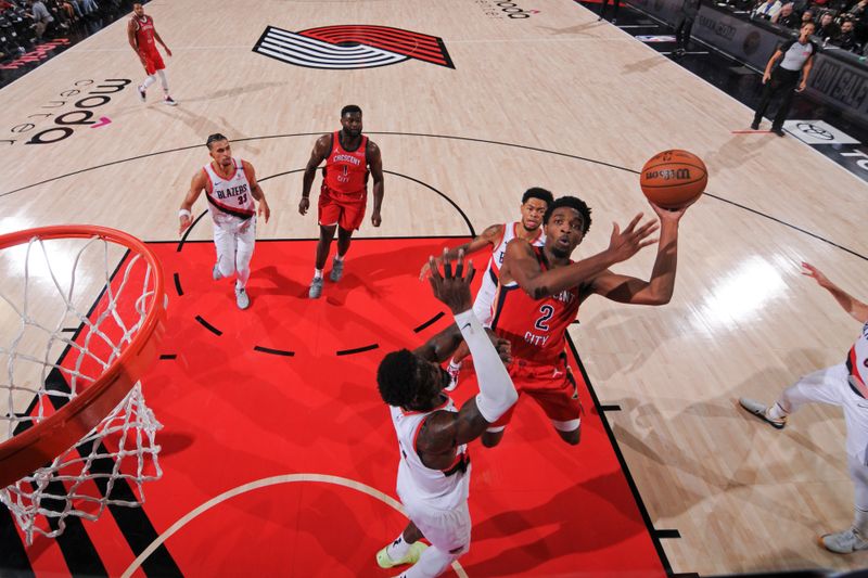 PORTLAND, OR - OCTOBER 27: Herbert Jones #2 of the New Orleans Pelicans drives to the basket during the game against the Portland Trail Blazers on October 27, 2024 at the Moda Center Arena in Portland, Oregon. NOTE TO USER: User expressly acknowledges and agrees that, by downloading and or using this photograph, user is consenting to the terms and conditions of the Getty Images License Agreement. Mandatory Copyright Notice: Copyright 2024 NBAE (Photo by Cameron Browne/NBAE via Getty Images)