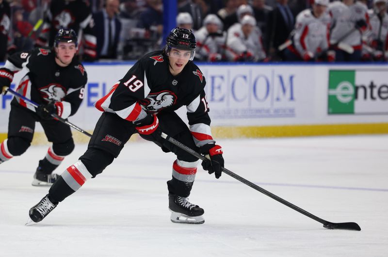 Jan 6, 2025; Buffalo, New York, USA;  Buffalo Sabres center Peyton Krebs (19) looks to make a pass during the second period against the Washington Capitals at KeyBank Center. Mandatory Credit: Timothy T. Ludwig-Imagn Images