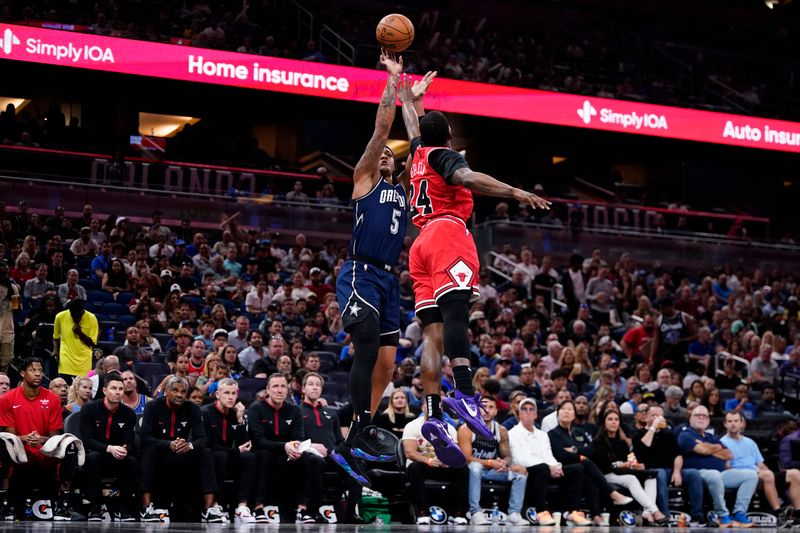 ORLANDO, FLORIDA - APRIL 07: Paolo Banchero #5 of the Orlando Magic goes up for a shot against Javonte Green #24 of the Chicago Bulls during the first quarter at Kia Center on April 07, 2024 in Orlando, Florida. NOTE TO USER: User expressly acknowledges and agrees that, by downloading and or using this photograph, User is consenting to the terms and conditions of the Getty Images License Agreement. (Photo by Rich Storry/Getty Images)