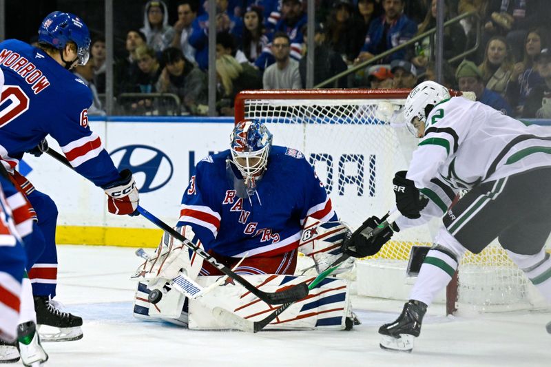 Dec 2, 2025; New York, New York, USA;  New York Rangers goaltender Igor Shesterkin (31) makes a save as New York Rangers defenseman Scott Morrow (60) defends against Dallas Stars center Mavrik Bourque (22) during the second period at Madison Square Garden. Mandatory Credit: Dennis Schneidler-Imagn Images