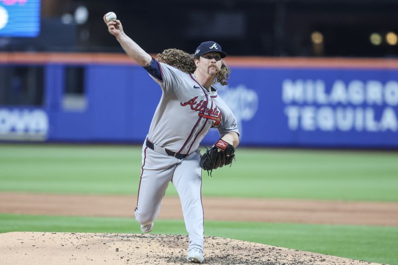 Jun 26, 2025; New York City, New York, USA;  Atlanta Braves starting pitcher Grant Holmes (66) pitches in the third inning against the New York Mets at Citi Field. Mandatory Credit: Wendell Cruz-Imagn Images