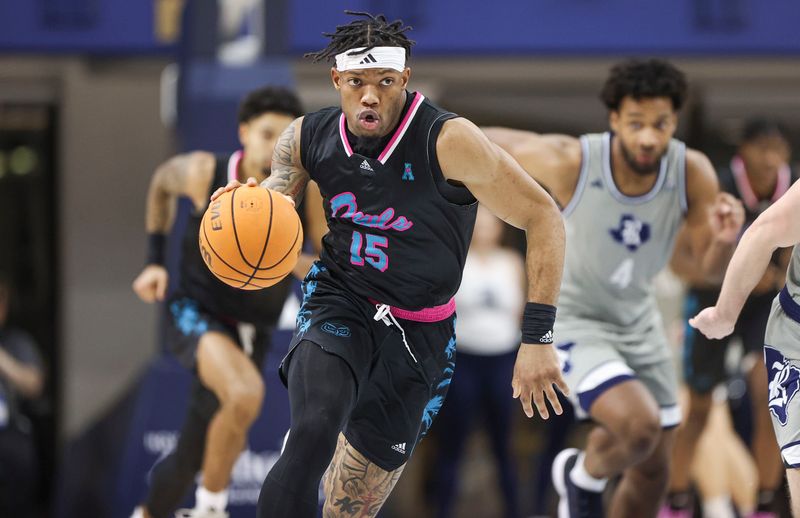 Jan 24, 2024; Houston, Texas, USA; Florida Atlantic Owls guard Alijah Martin (15) drives with the ball on a fast break during the second half against the Rice Owls at Tudor Fieldhouse. Mandatory Credit: Troy Taormina-USA TODAY Sports