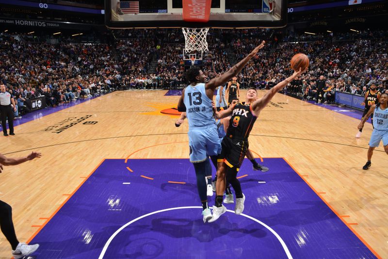 PHOENIX, AZ - FEBRUARY 11:  Grayson Allen #8 of the Phoenix Suns shoots the ball during the game against the Memphis Grizzlies on February 11, 2025 at Footprint Center in Phoenix, Arizona. NOTE TO USER: User expressly acknowledges and agrees that, by downloading and or using this photograph, user is consenting to the terms and conditions of the Getty Images License Agreement. Mandatory Copyright Notice: Copyright 2025 NBAE (Photo by Barry Gossage/NBAE via Getty Images)