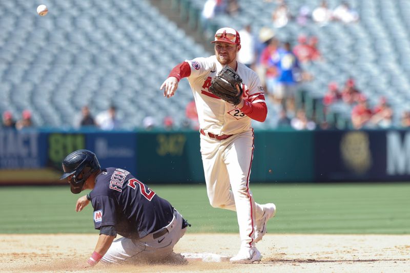 Sep 10, 2023; Anaheim, California, USA; Los Angeles Angels second baseman Brandon Drury (23) turns to throw to first base during the sixth inning of the game against the Cleveland Guardians at Angel Stadium. Mandatory Credit: Jessica Alcheh-USA TODAY Sports