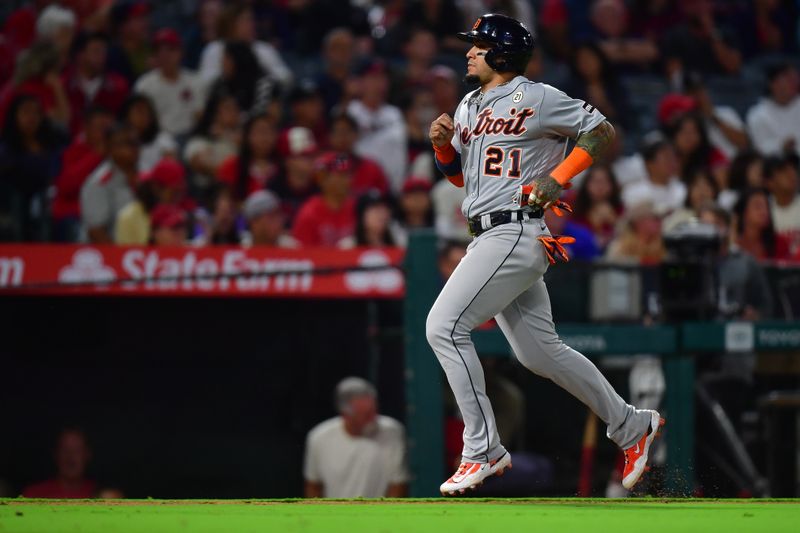 Sep 15, 2023; Anaheim, California, USA; Detroit Tigers shortstop Javier Baez (28) runs home to score against the Los Angeles Angels during the eighth inning at Angel Stadium. Mandatory Credit: Gary A. Vasquez-USA TODAY Sports