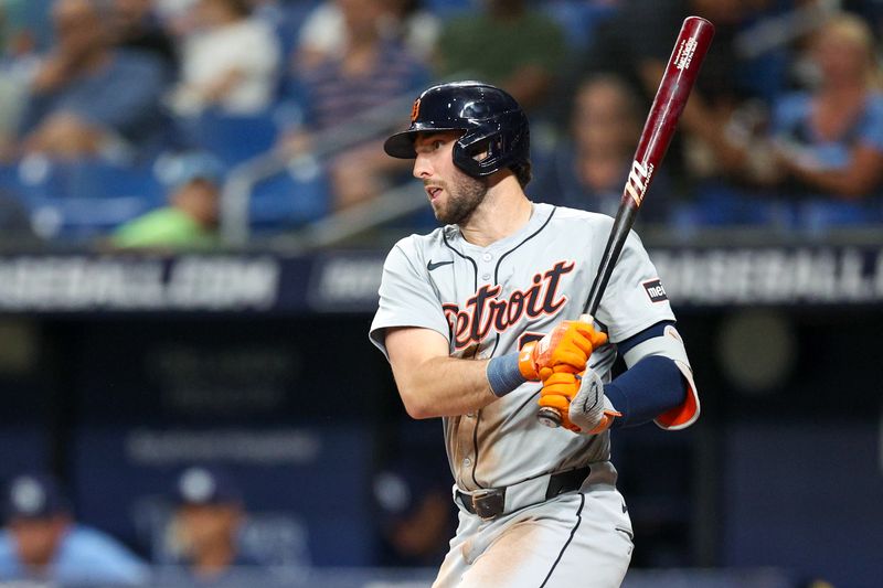 Apr 24, 2024; St. Petersburg, Florida, USA;  Detroit Tigers third baseman Matt Vierling (8) singles against the Tampa Bay Rays in the fourth inning at Tropicana Field. Mandatory Credit: Nathan Ray Seebeck-USA TODAY Sports